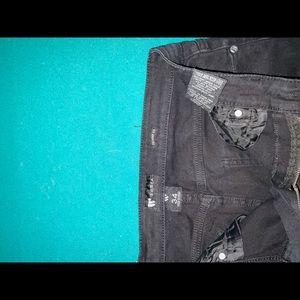 I have a pair of stylish flexible black skinny jeans.